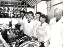 Shop staff with Gwenda and Peter on right